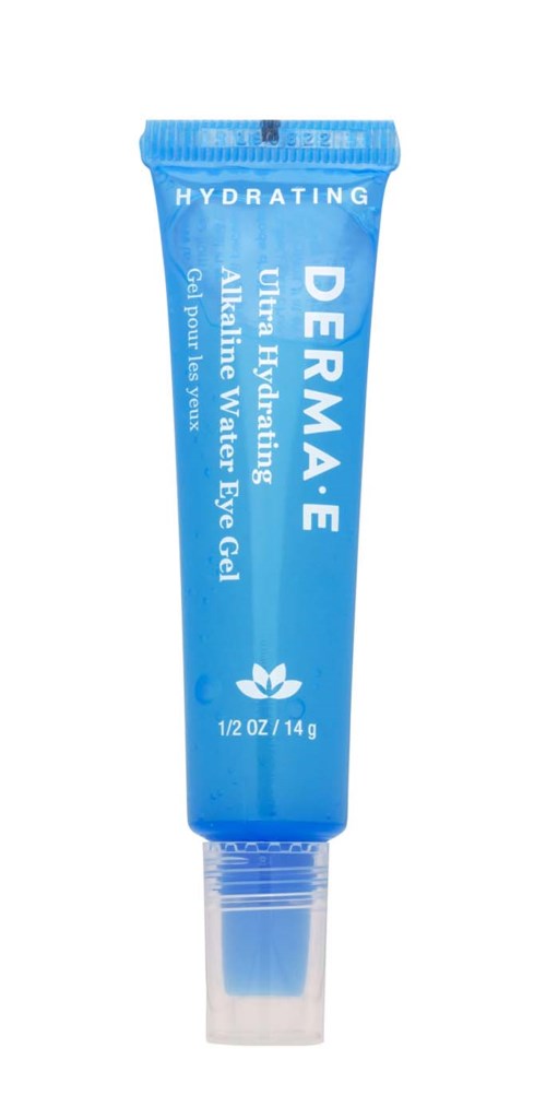 Blue tube of eye gel with white text, including brand name I Derma E and product description. Small flower logo at bottom.