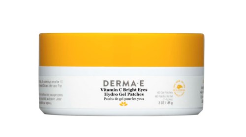 A white jar with a yellow lid, labeled Derma E Vitamin C Bright Eyes Hydro Gel Patches, for under-eye care.