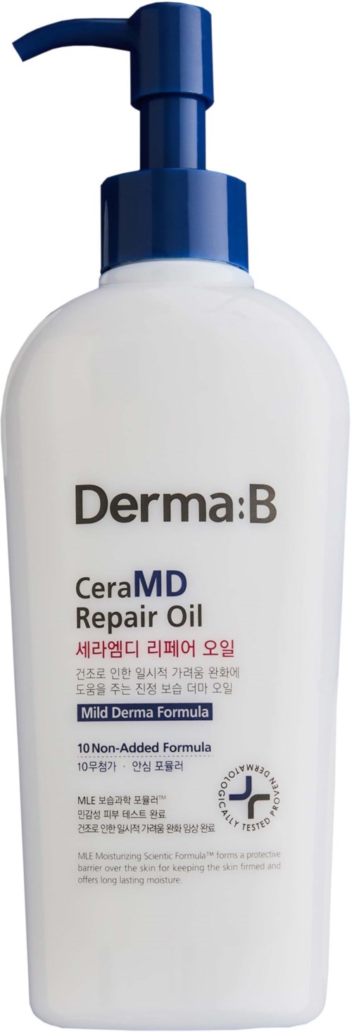 Een witte fles met blauwe pomp met label Derma:B CeraMD Repair Oil, voor huidverzorging, beweert mild en zonder toevoegingen te zijn.