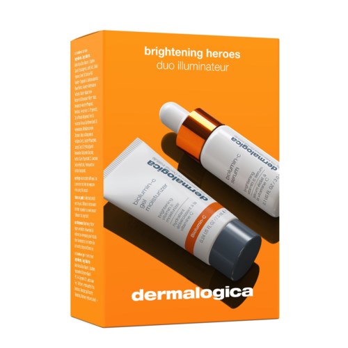 Ett hudvårdsset med två Dermalogica-produkter i orange och vit förpackning på en orange förpackning.