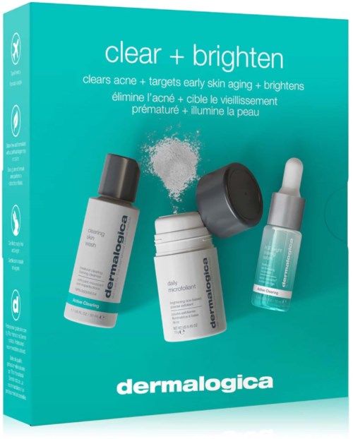 Een huidverzorgingsset met poeder, een crèmepot en een serum-druppelaar voor acne en opfrissing.