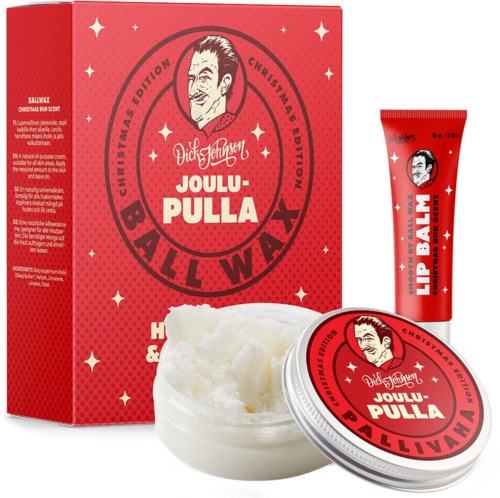 Ett jul-tema läppbalsam och handkrämset med röd förpackning, julstjärnor och ett tecknat ansikte.