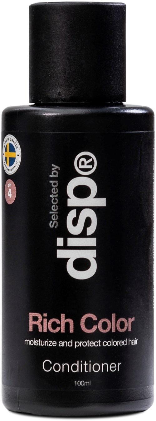 Svart flaska märkt 'Dispol' med 'Rich Color' för att återfukta och skydda färgat hår.