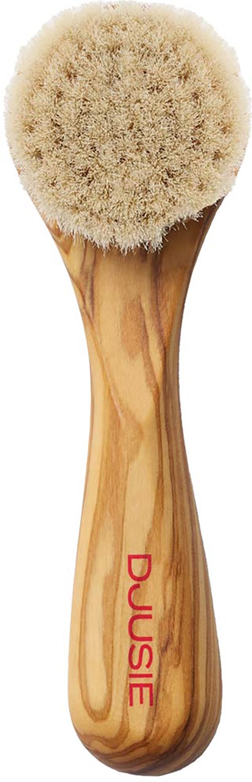 A wooden brush with a round, soft bristle head and the brand name "DUUSIE" on the handle.