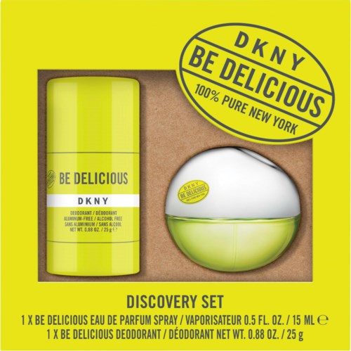 Ett DKNY discovery kit med en grön deodorant och en rund behållare, allt i gul förpackning. Inkluderar en klistermärke.