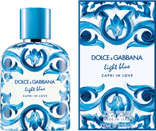 En parfymeflaske og eske i blått med dekorative bølger, merket 'Light Blue' av Dolce & Gabbana.