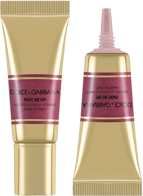 To guld- og pinktuber af Dolce & Gabbana leppemaling står oprejst og vippet.