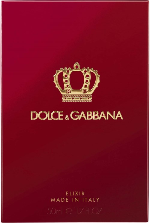 En röd låda med en guldkrona och texten Dolce & Gabbana, Elixir, Made in Italy, 50 ml.