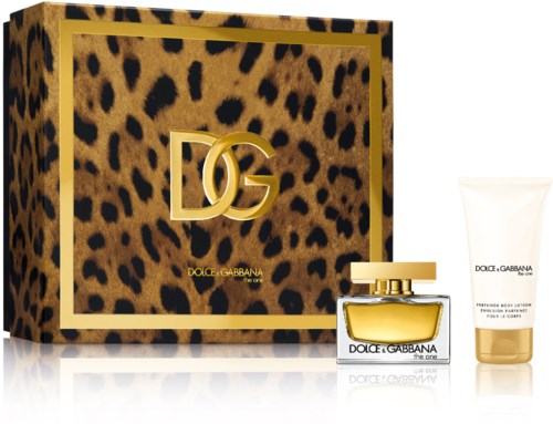 En låda med leopardmönster, ett stort guldfärgat DG-logotyp, parfyllflaska och krämrör för Dolce & Gabbana.