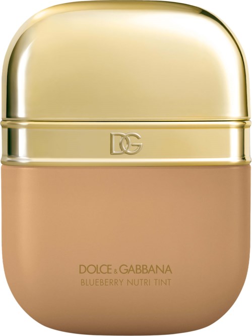 A small beige and gold container labeled Dolce & Gabbana Blueberry Nutri Tint. It looks like a cosmetic or skincare product.