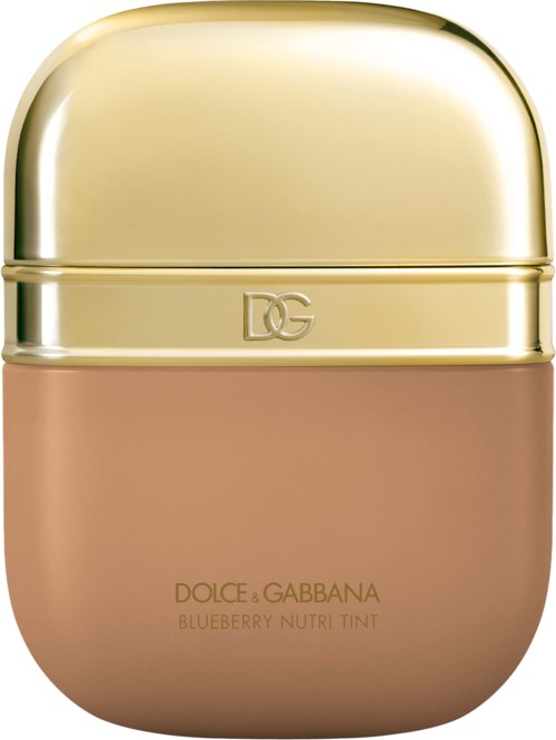 A small, beige container with a shiny gold cap, labeled Dolce & Gabbana Blueberry Nutri Tint.