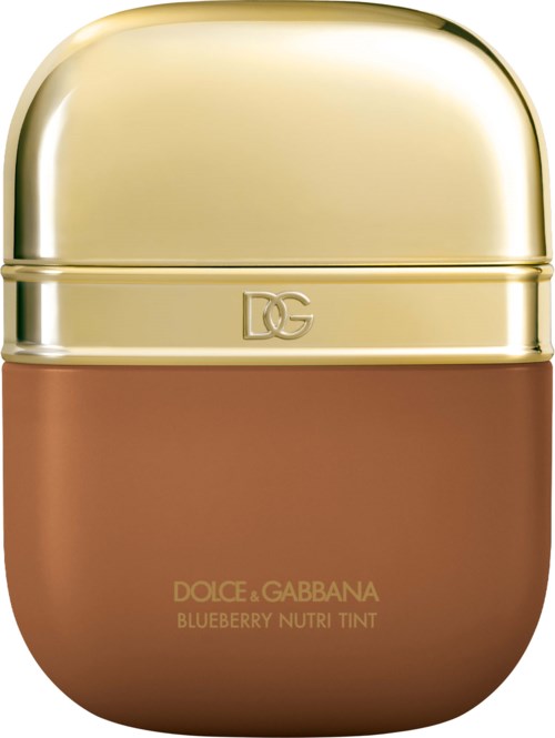 A small, round container with a shiny gold lid and brown body. It shows the Dolce & Gabbana logo and product name.
