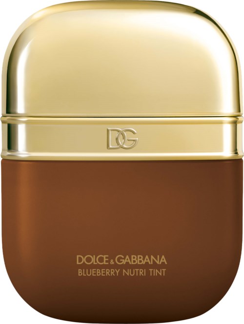 A small container with a shiny gold top and brown bottom, labeled Dolce & Gabbana blueberry lip tint.
