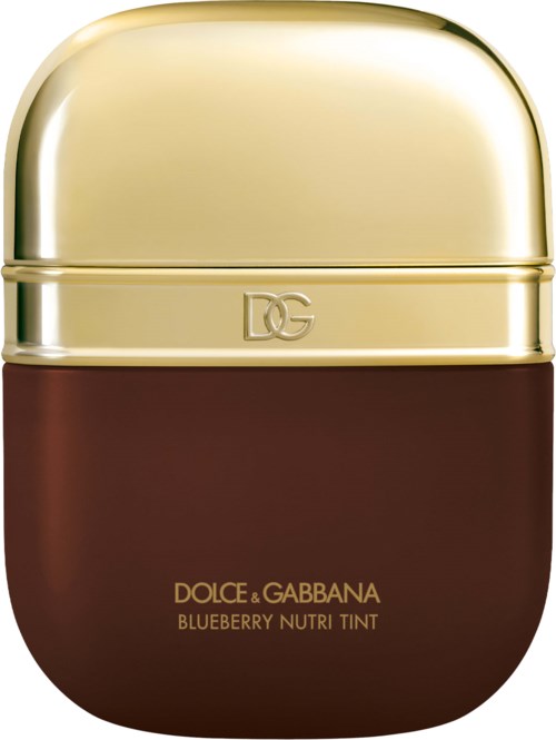 A small brown container with a gold top. It is a beauty product labeled "Dolce & Gabbana Blueberry Nutri Tint."