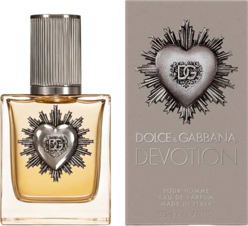 A perfume bottle with a silver heart and sunburst design, and a matching box displaying the DG logo and product name.