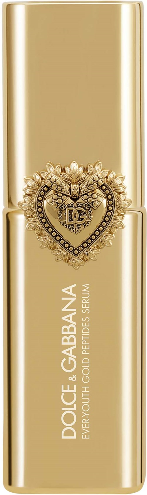 Złota butelka serum Youth Gold Peptides od Dolce & Gabbana z ozdobnym sercem na przedzie.