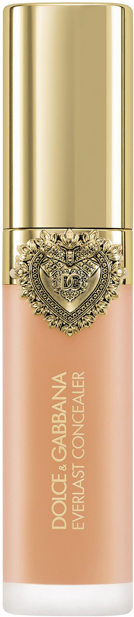 A lipstick tube with a gold cap and a decorative heart-shaped charm hanging from it.