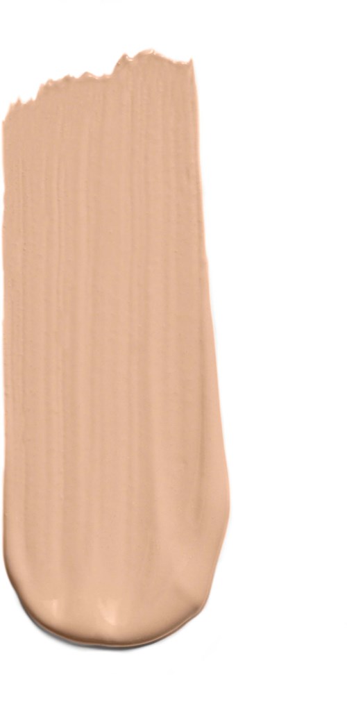 En beige sminkeprøve med jevn tekstur, påført i en vertikal stripe på en hvit bakgrunn.