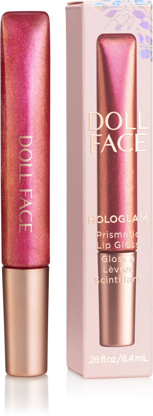 Rosa og gull tube med lipgloss og eske, merket sier 'Doll Face Hologlam'.