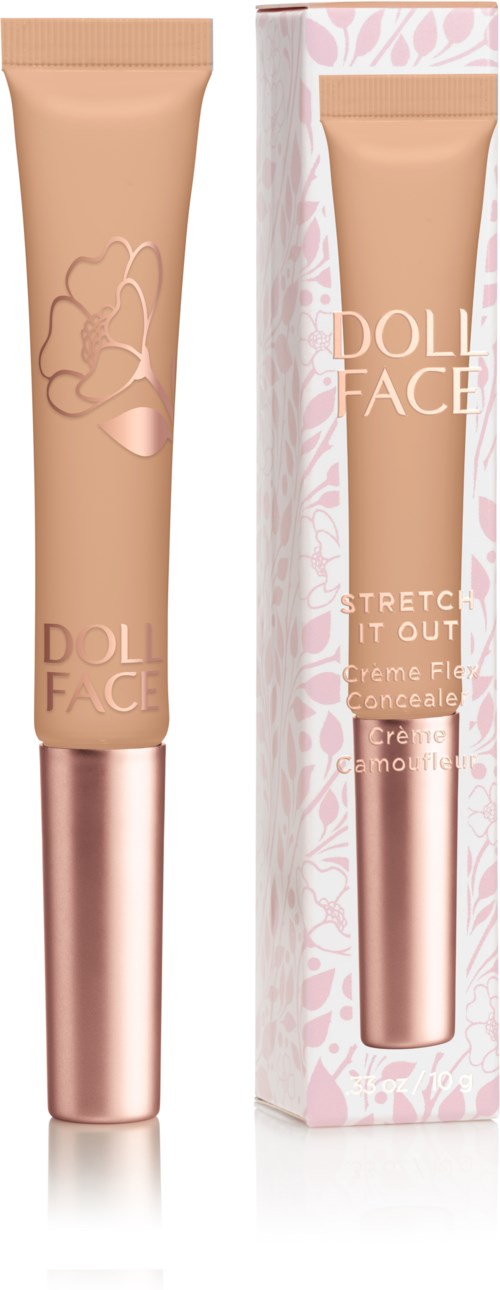 En beige tube med rosa lokk, ved siden av en matchende eske med blomsterdesign, merket 'DOLL FACE' og 'Stretch It Out'.