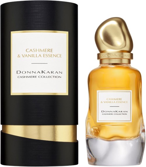 A perfume bottle with a rounded gold cap and a black box with gold and white label.