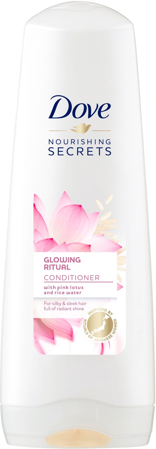 Dove sjampo-flaske med rosa lotusblomst og hvit lokk. Det er en nærende balsam for hud og hår.