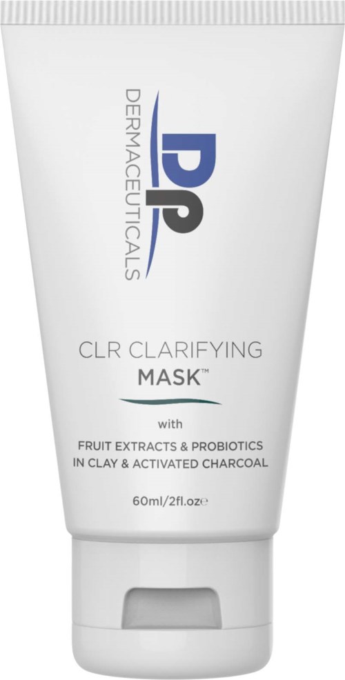 White tube of a skincare mask with blue and black text, mentions clarifying, fruit extracts, probiotics, clay, and activated charcoal.
