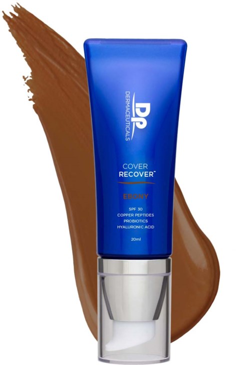 Ein blauer Tube mit Hautpflegeprodukt mit weißen und silbernen Details, neben einem braunen Flüssigkeitsstrich.