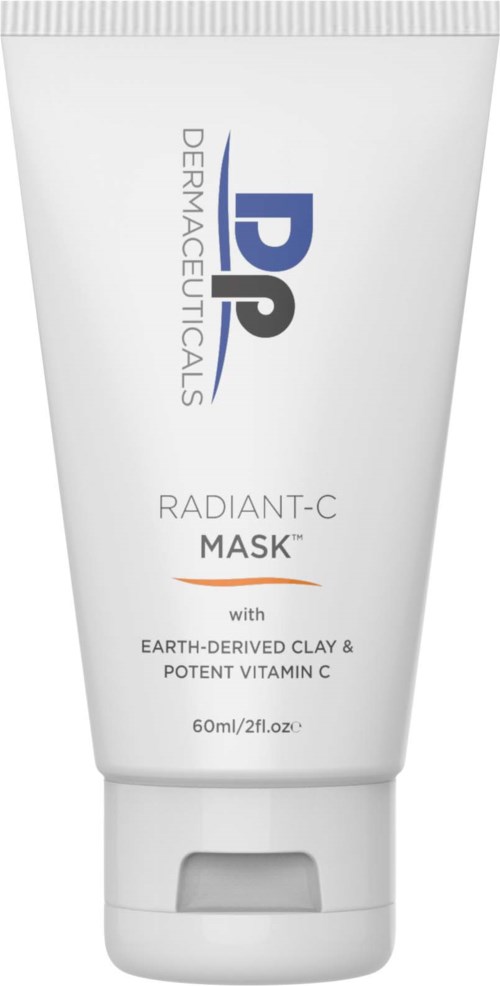 Eine weiße Tube mit blauer und schwarzer Schrift, als Gesichtsmasken mit Ton und Vitamin C gekennzeichnet.