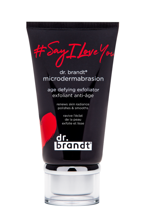 En svart tub med exfoliator med röd och vit text, som säger '#SayILoveYou' och 'dr. brandt microdermabrasion' med ett genomskinligt lock.