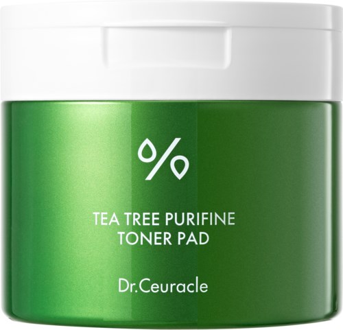 Grüner Behälter mit weißem Deckel, beschriftet 'Tea Tree Purifine Toner Pad' von Dr. Ceuracle.