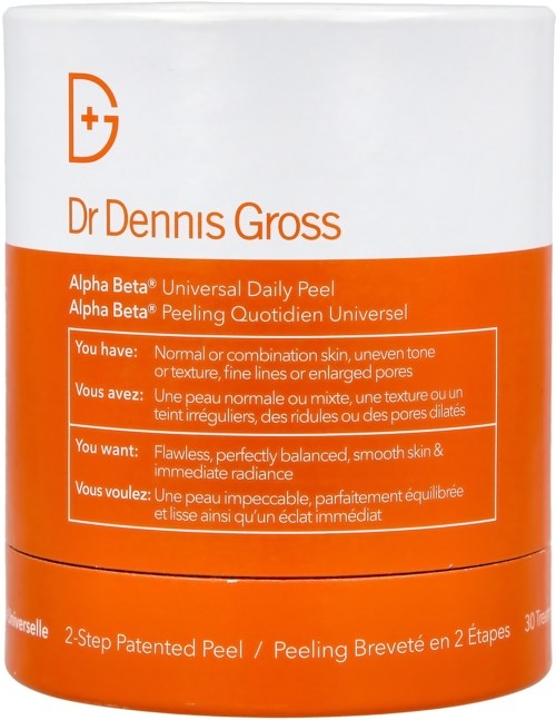 Ett vitt burk med etiketten 'Dr Dennis Gross' med orange detaljer, som marknadsför Alpha Beta peeling för förbättring av huden.