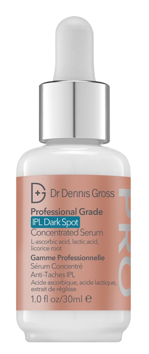 En vit flaska med pipettlock innehåller serum för huden med mörka fläckar, märkt med varumärke och produktdetaljer.