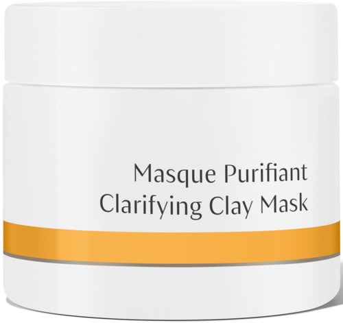 En hvit krukke merket 'Clarifying Clay Mask' med en gul stripe, brukt til ansiktspleie.