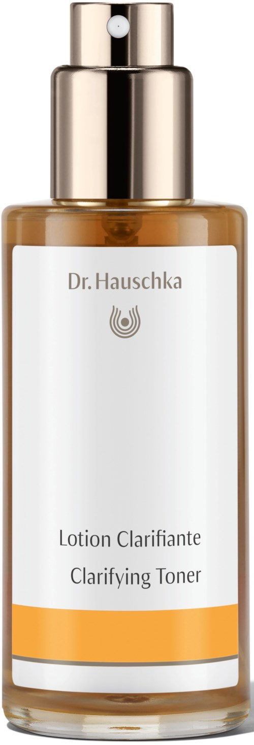 A bottle of Clarifying Toner with a spray top, label shows brand Dr. Hauschka, and a simple design.