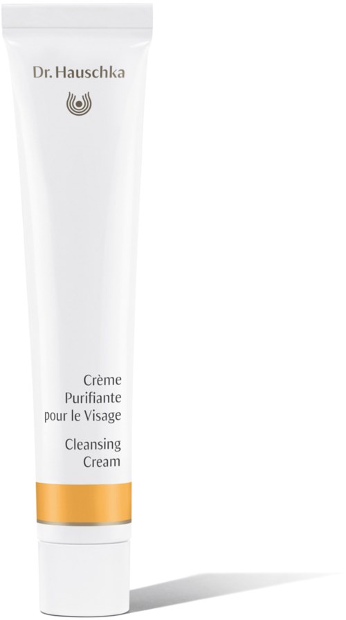 Valkoinen tuba kullanauhalla, merkitty 'Dr. Hauschka Cleansing Cream' kasvojenhoitoon.