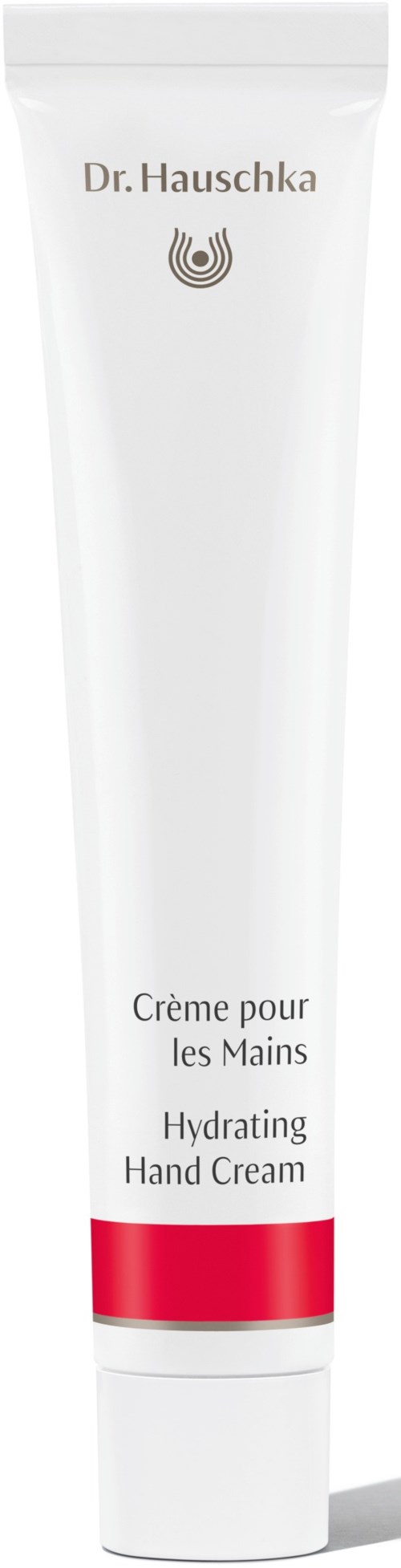 En vit tub märkt 'Dr. Hauschka Hydrating Hand Cream' med ett rött band nära botten.