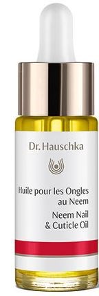 En liten dropperflaska märkt 'Dr. Hauschka Neem Nail & Cuticle Oil' med vit topp och gul olja inuti.
