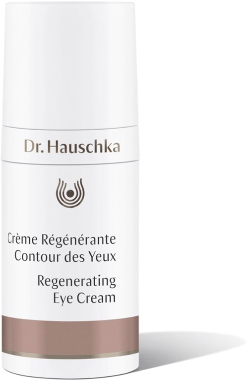En hvit tube med øyekrem med brune og beige merker, merket på fransk og engelsk, fra Dr. Hauschka.