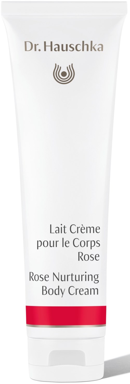 En vit tub med Dr. Hauschka Rose Body Cream med ett rött band nära botten.