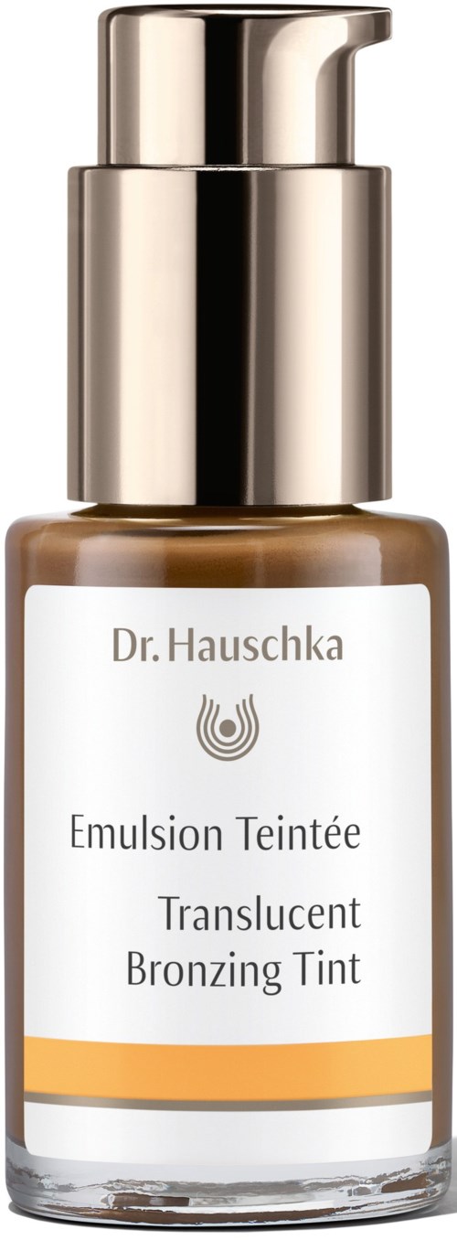 En liten flaske med pump, merket Dr. Hauschka, inneholder lett brunaktig selvbruning.