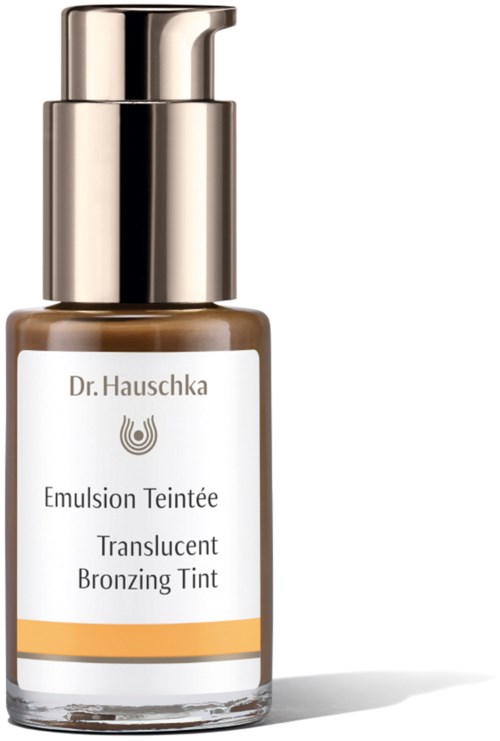 En flaska med Dr. Hauschka-bronsningstint med pump och vit etikett.
