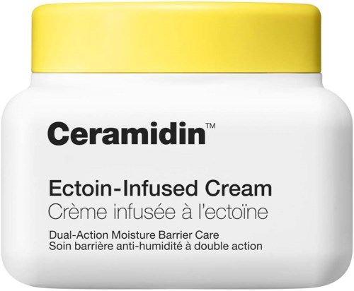 A white jar with a yellow lid, labeled Ceramidin Ectoin-Infused Cream for skin care.
