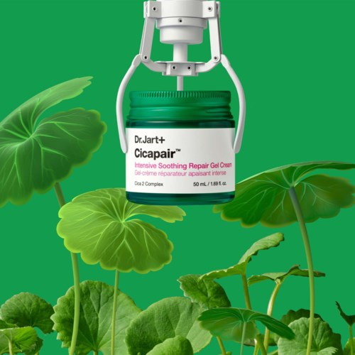 A jar of Dr. Jart+ Cicapair cream hanging from mechanical claws among green leaves.