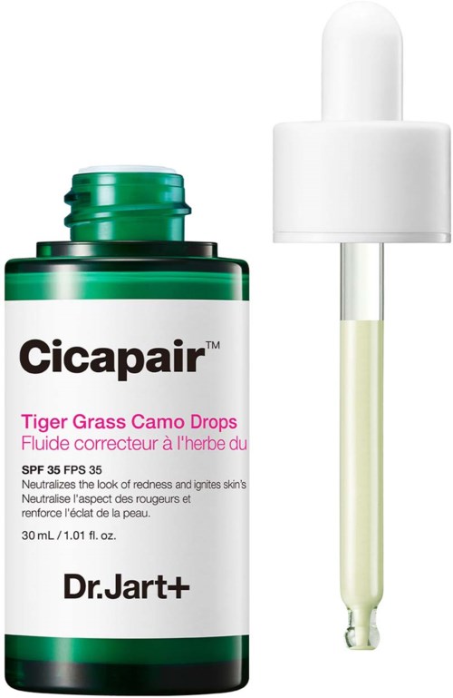 A green and white bottle of acne treatment drops with a dropper.