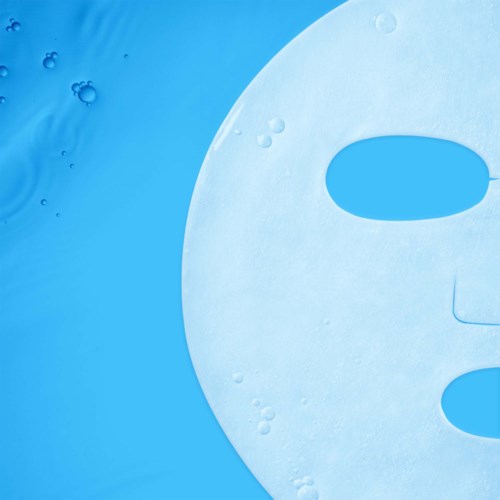 A white face mask with holes in the eye and mouth area, floating on a blue background.