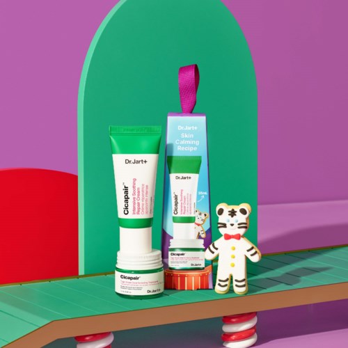 Skincare products, a cute zebra plush toy, and colorful backgrounds on a playful shelf.