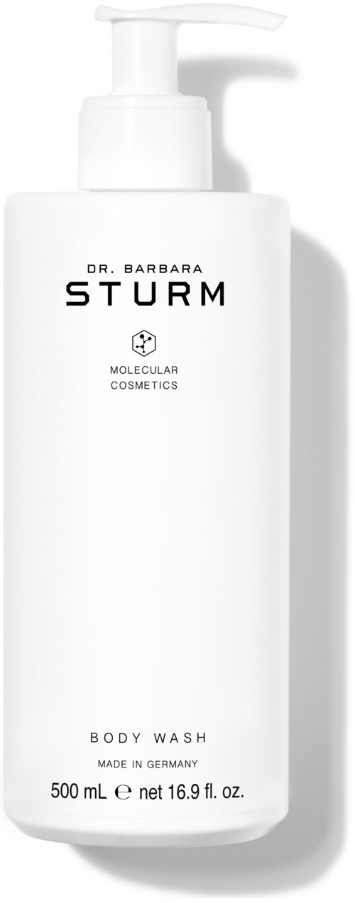 En vit flaska med Dr. Barbara Sturm kroppstvål med pump, märkt med produktuppgifter och storlek.