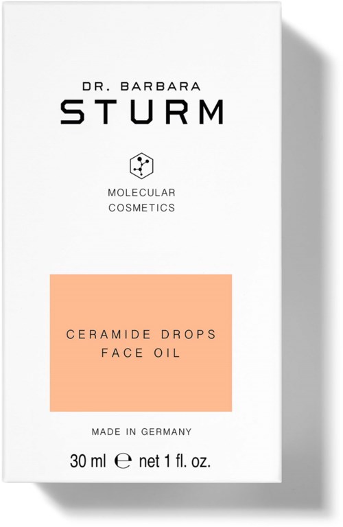 Biała etykieta dla Dr. Barbara Sturm's Ceramide Drops Face Oil, 30 ml, wyprodukowane w Niemczech, z minimalistycznym wzorem i tekstem.