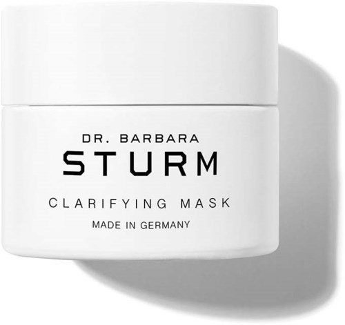 En vit burk märkta 'Dr. Barbara Sturm Clarifying Mask, Made in Germany.'